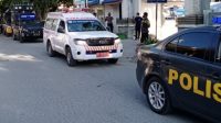Jenazah Pasien Korban Covid-19 di Palu Dimakamkan dengan Pengawalan Polisi