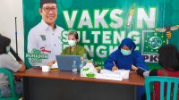Warga Antusias Ikut Vaksinasi Gratis PKB Palu