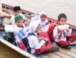MBG Bantu Penuhi Gizi Anak-Anak Nelayan dan Petani di Seberang Sungai Musi
